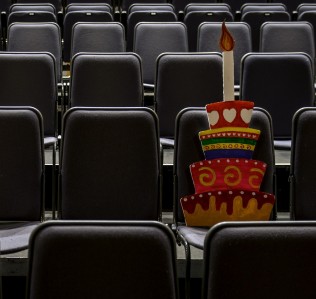 Cut out of a cake on theatre seats